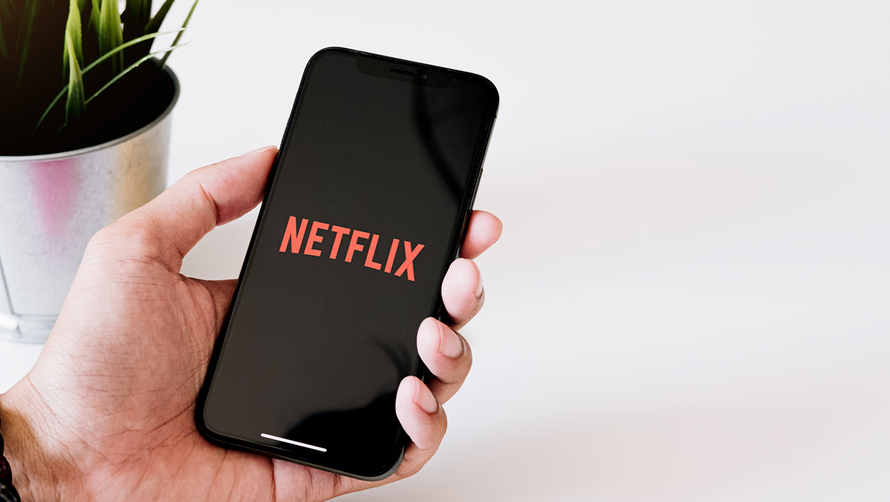 Netflix offers four plans to its users in India, which includes a mobile-only streaming plan for INR 199 per month, and the other three plans, Basic, Standard and Premium, which are available for INR 499, 649 and 799, respectively. While the 199 plan only offers one concurrent stream only on mobile and tablet, the Basic plan offers the same on mobile as well as laptops and TV. The Standard plan brings in two concurrent stream and HD quality videos, while Premium gets you four concurrent streams and Ultra HD videos. Currently, all of these plans are available with a one-month free trial. With the increasing popularity of the service, the login credentials of paid users have landed on the Dark web time and again and if see a profile which you didn't make, it's possible that someone else has access to your Netflix account. To get your account's control back, you can sign out of all active sessions, change your password and delete the other profile.  In this article, we've put together a simple guide to help you delete a Netflix profile from your account either via the website on PC or through your Netflix app on Android or iOS. Also read: What is the Download Limit for Netflix and tips & tricks How to delete a Netflix profile on PC? Log in to your account and follow the steps mentioned below to delete a Netflix profile from your account on a PC. Step 1: On the profile selection screen, click on Manage ProfilesStep 2: A pencil (edit) icon will appear on all of the profiles. Click on the profile you wish to delete. Step 3: On the next page, click on Delete Profile. How to delete a Netflix profile on a smartphone? Log in to the app and follow the steps mentioned below to delete a Netflix profile from your account on Android or iOS. Tap on the pencil (edit) icon on the top-right of the screen. A pencil (edit) icon will appear on all of the profiles. Tap on the profile you wish to delete. On the next page, tap on Delete Profile. Also read: Netflix error codes for Android, iOS, PC, consoles and more; How to fix them?